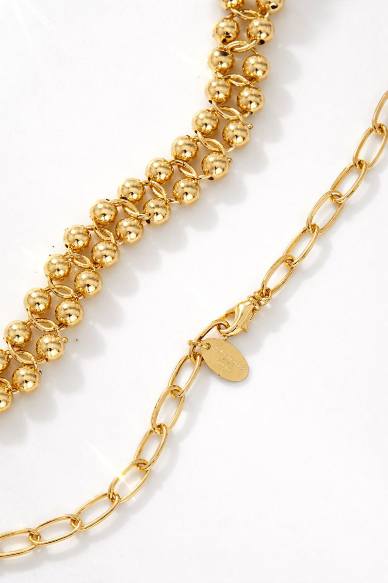 NANNINI bauletto pelle intrecciata marrone logo oro catena
